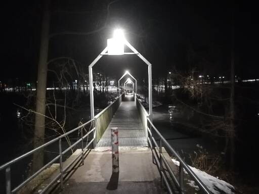 The bridge to the park

When I lived at my last apartment 
I lived a couple…
